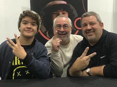 Gaetano Matarazzo is showing one, Gaten Matarazzo Sr. is showing two, and Gaten Matarazzo is showing three fingers, suggesting their generation.